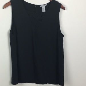 Black sleeveless top with lace insert a the v neck large